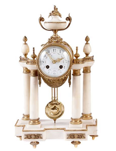 Appraisal: A French gilt metal mounted marble mantel clock height in