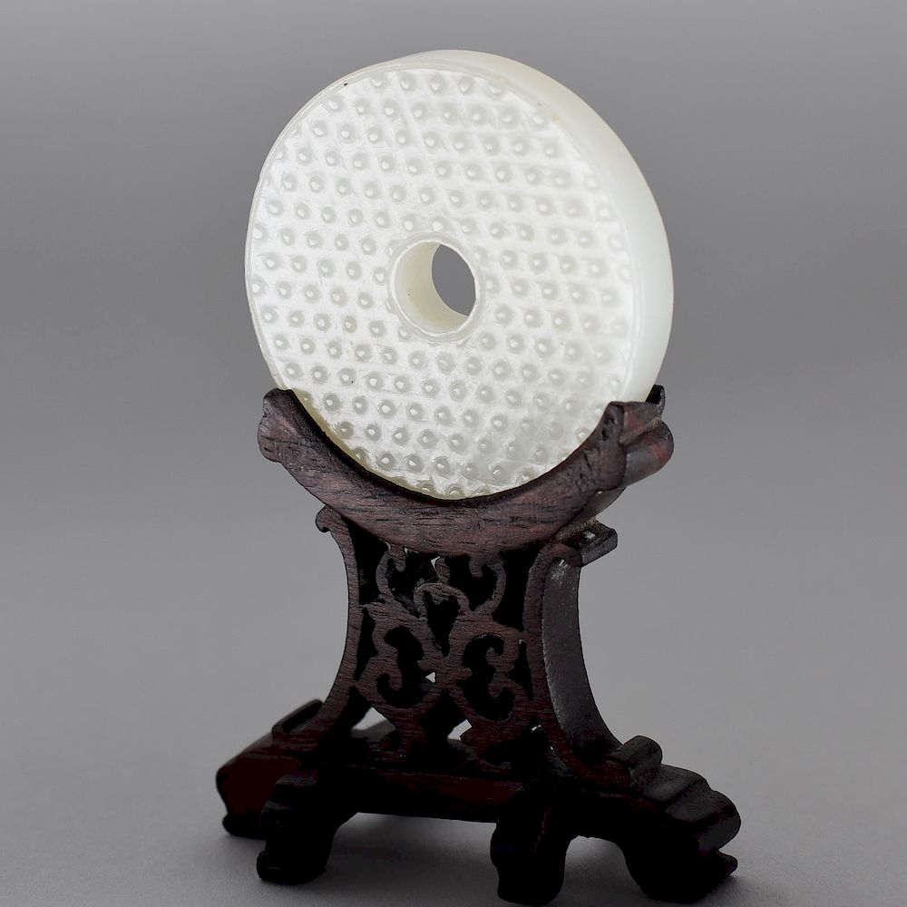 Appraisal: Qing Chinese Carved Jade Bi with Stand th century Chinese