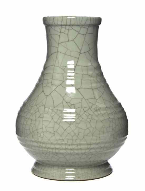 Appraisal: A Chinese Celadon Glaze Baluster Vase having raised decorative rings