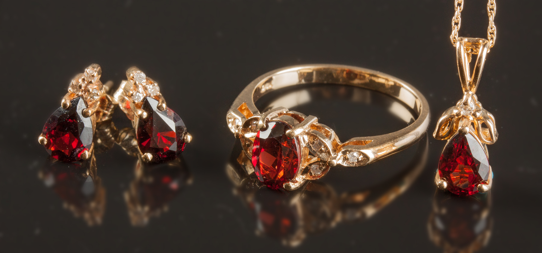 Appraisal: Gold Garnet Diamond Earrings Ring Pendant L to R k