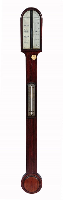 Appraisal: A TH CENTURY ROSEWOOD STICK BAROMETER the arched ivory dial