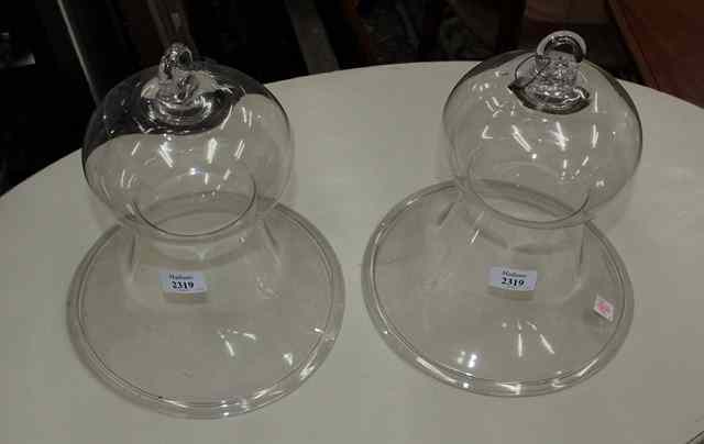 Appraisal: A PAIR OF TH CENTURY GLASS GAS MANTEL DOMES of