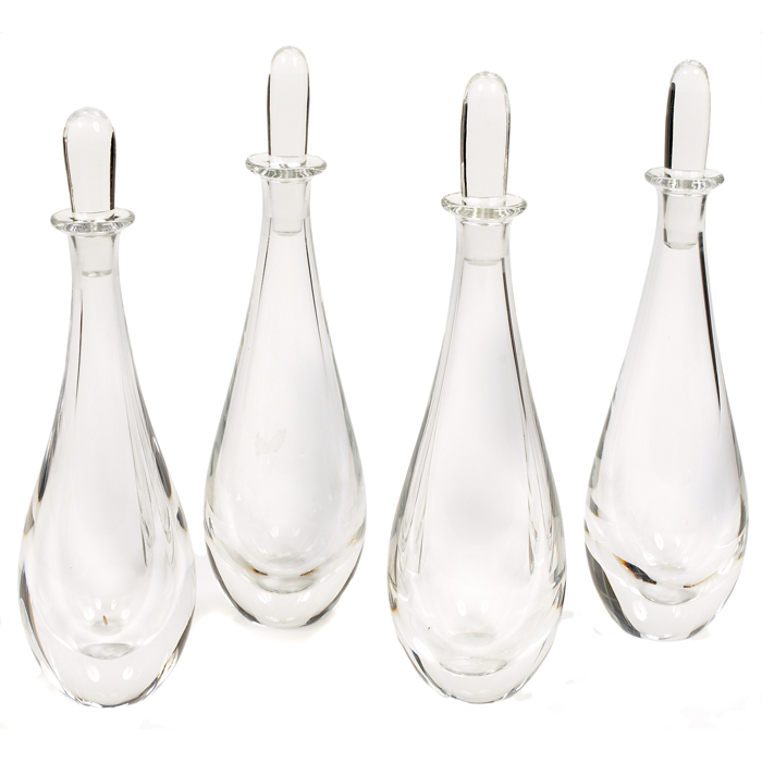 Appraisal: Vicke Lindstrand decanters four Orrefors c clear glass forms with