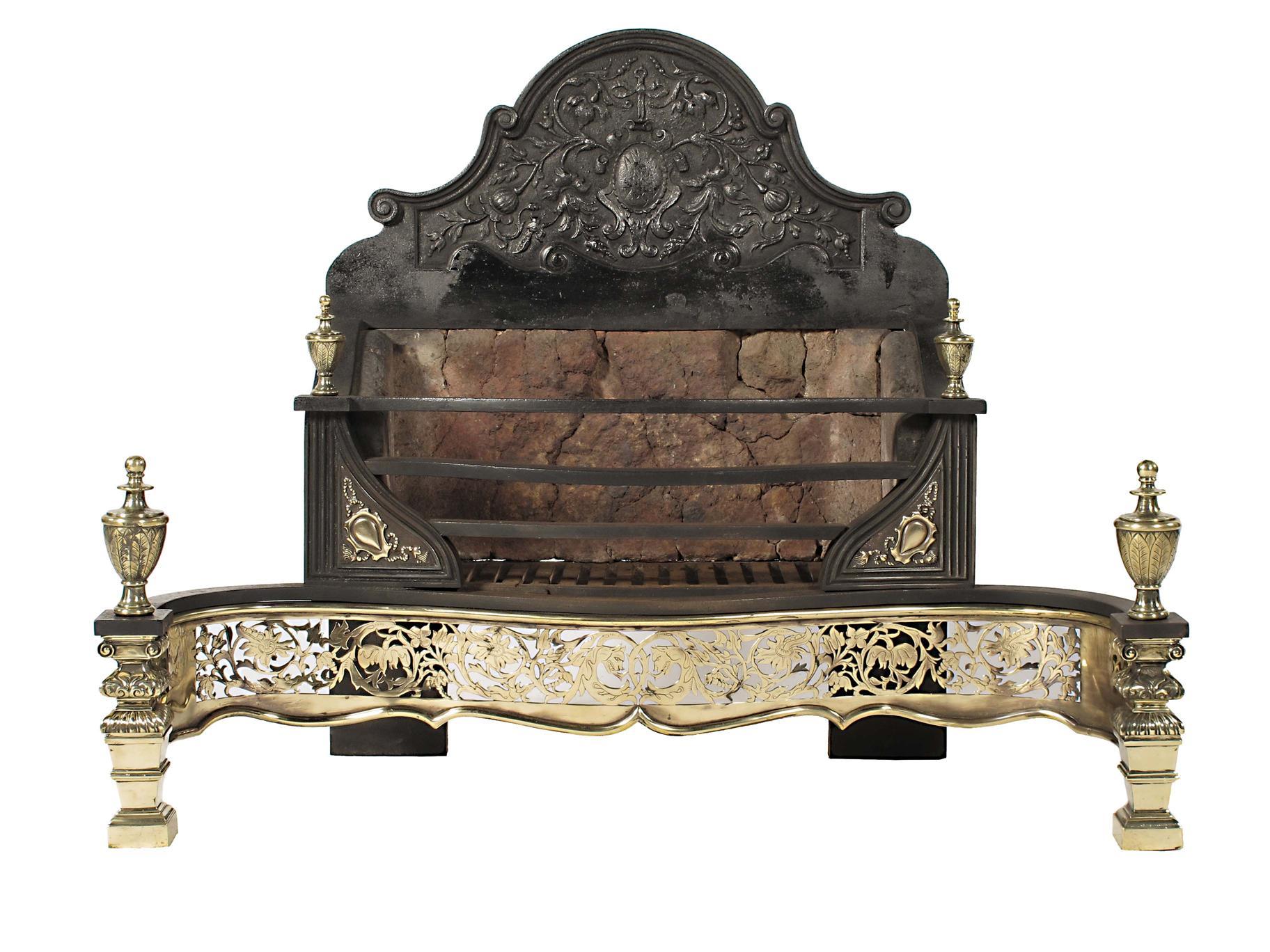 Appraisal: A cast iron and brass serpentine front firegrate by Thomas