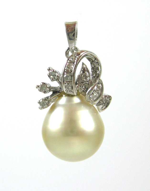 Appraisal: GOLDEN PEARL AND DIAMOND PENDANT k white gold with round-cut