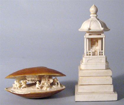 Appraisal: Two Japanese ivory okimono th century Comprised of a stained