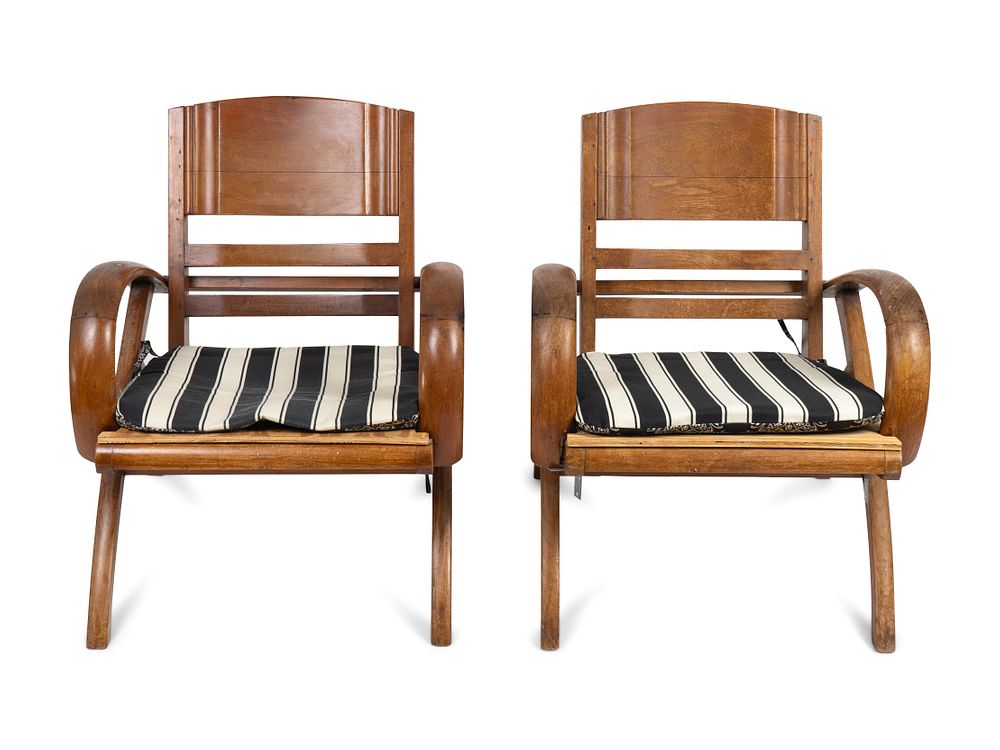 Appraisal: A Pair of British Colonial Teak Open Armchairs Heigh x