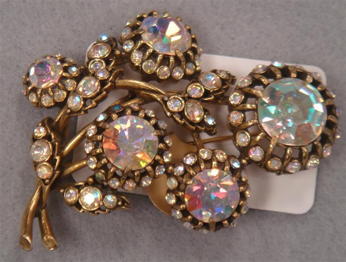 Appraisal: Flower spray brooch with aureola bourialis stones signed Hollycraft Estimate