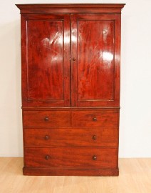 Appraisal: An early Victorian mahogany linen press the ogee moulded cornice