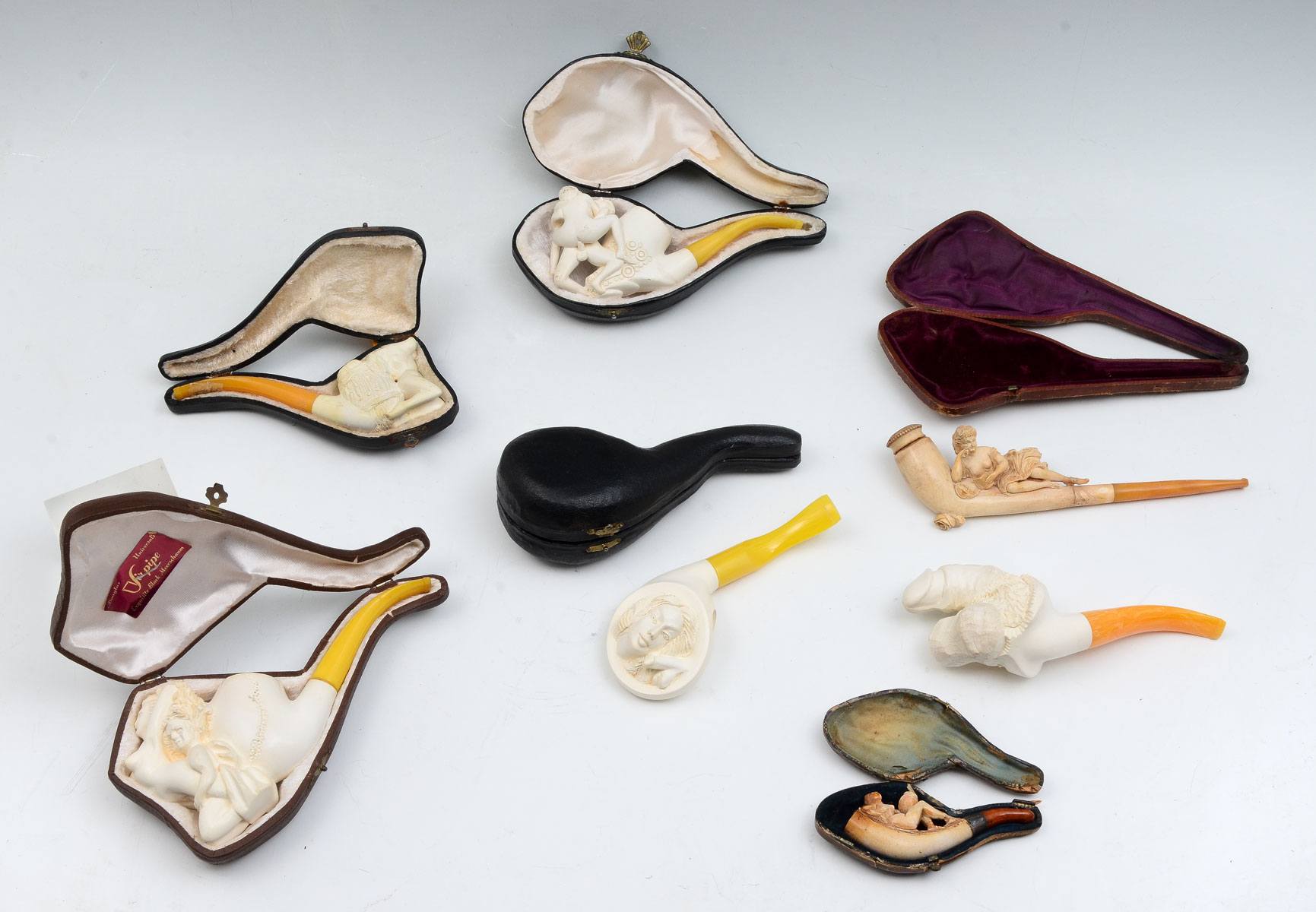 Appraisal: EROTIC MEERSCHAUM PIPE COLLECTION Collection consists of cased vintage pipes