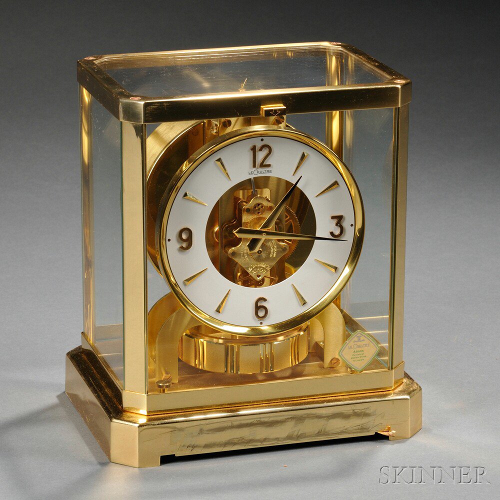 Appraisal: Atmos Brass and Glass Clock by Le Coultre Switzerland the