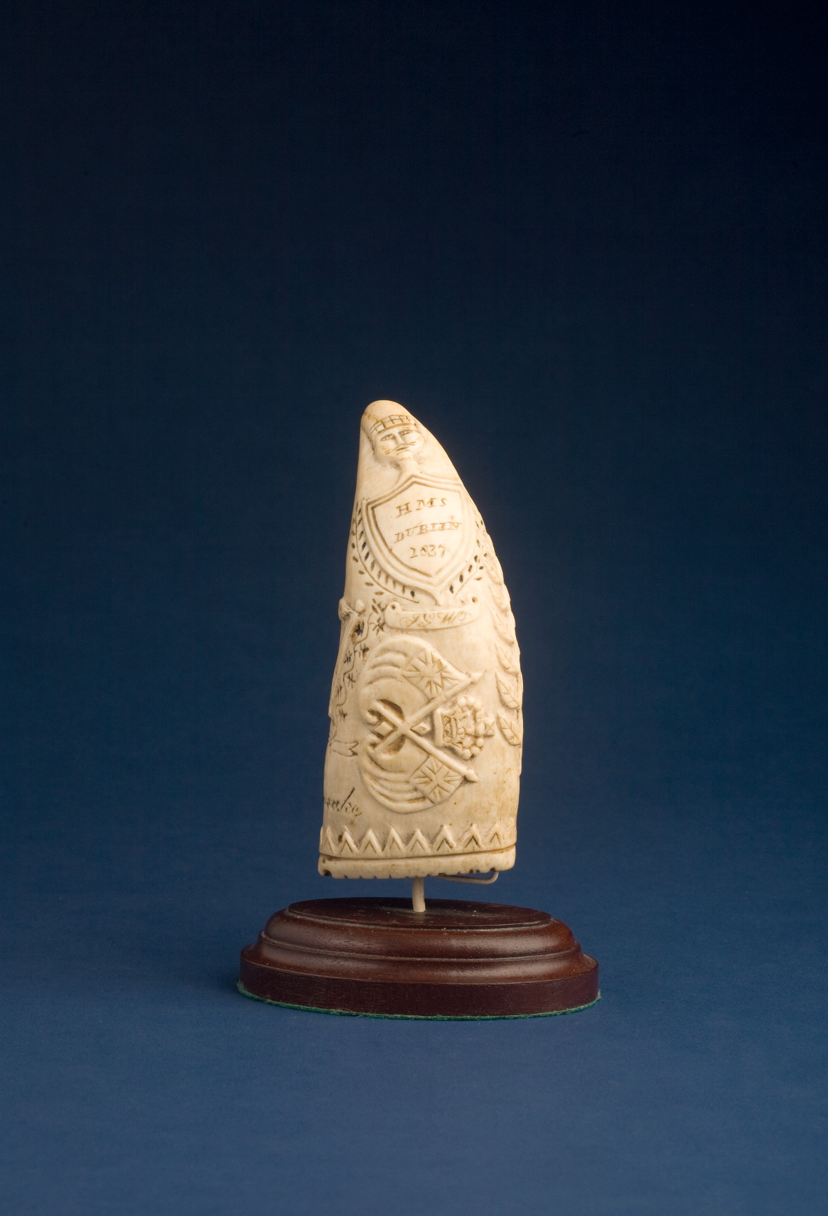 Appraisal: W WHEELER A SCRIMSHAW KEEPSAKE TOOTH AND STAMP CARVED ON