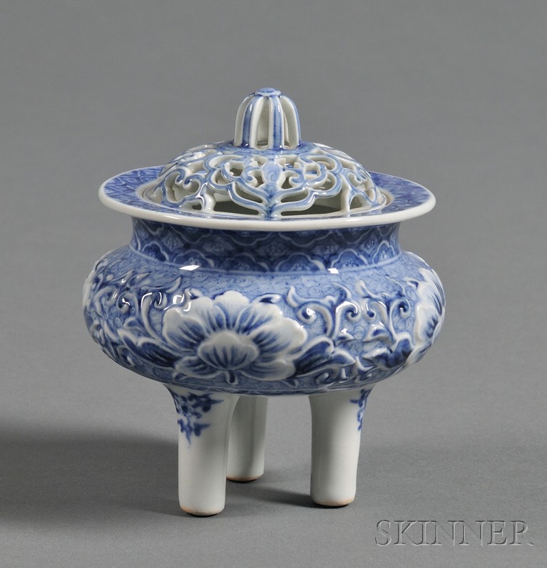 Appraisal: Porcelain Censer Japan th century tripod with relief work of