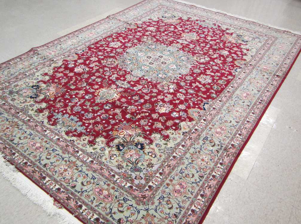 Appraisal: SIGNED PERSIAN SILK WOOL ISFAHAN CARPET hand knotted in a