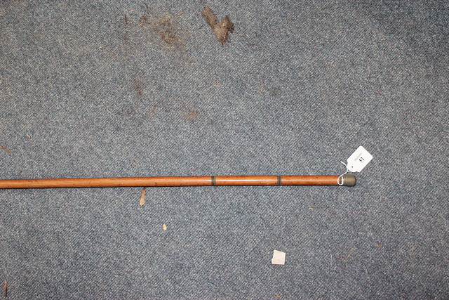 Appraisal: AN UNUSUAL MALACCA WALKING CANE unscrewing into two sections one