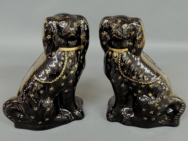 Appraisal: Pair of Staffordshire Jackfield black seated Spaniels late th c