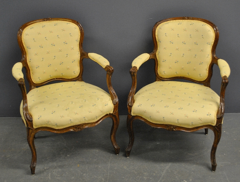 Appraisal: - Pair of French fruitwood fauteuils th c h x