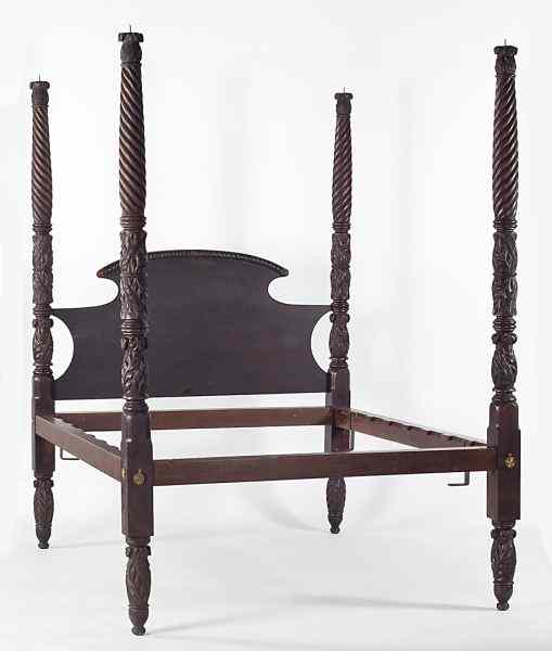 Appraisal: American Classical Carved Tall Post Bedcirca the shaped headboard with