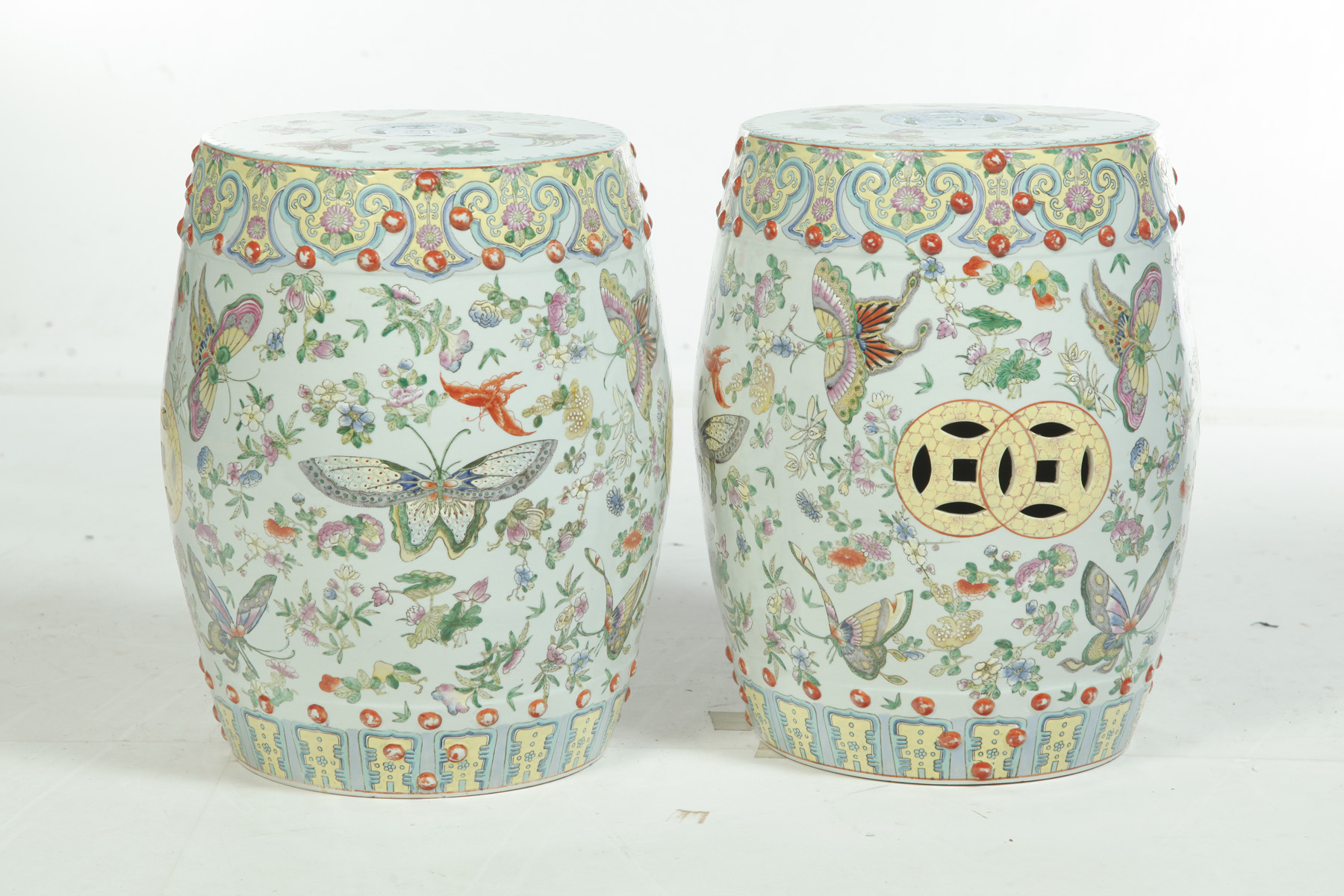 Appraisal: PAIR OF ORIENTAL PORCELAIN GARDEN SEATS Twentieth century Enamel decoration