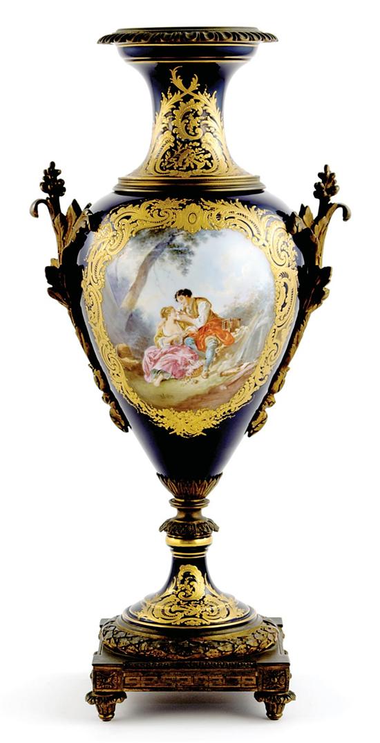 Appraisal: Sevres ormolu-mounted porcelain urn th century ornate country landscape scenic