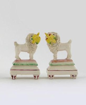 Appraisal: A pair of models of a spaniel carrying a bird