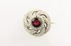 Appraisal: BROOCH - Victorian round rosette form brooch with central faceted