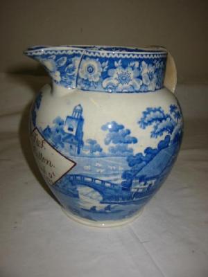 Appraisal: A PEARLWARE MARRIAGE JUG of tapering form blue painted in