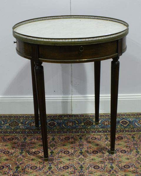 Appraisal: A French late th century mahogany and marble topped occasional