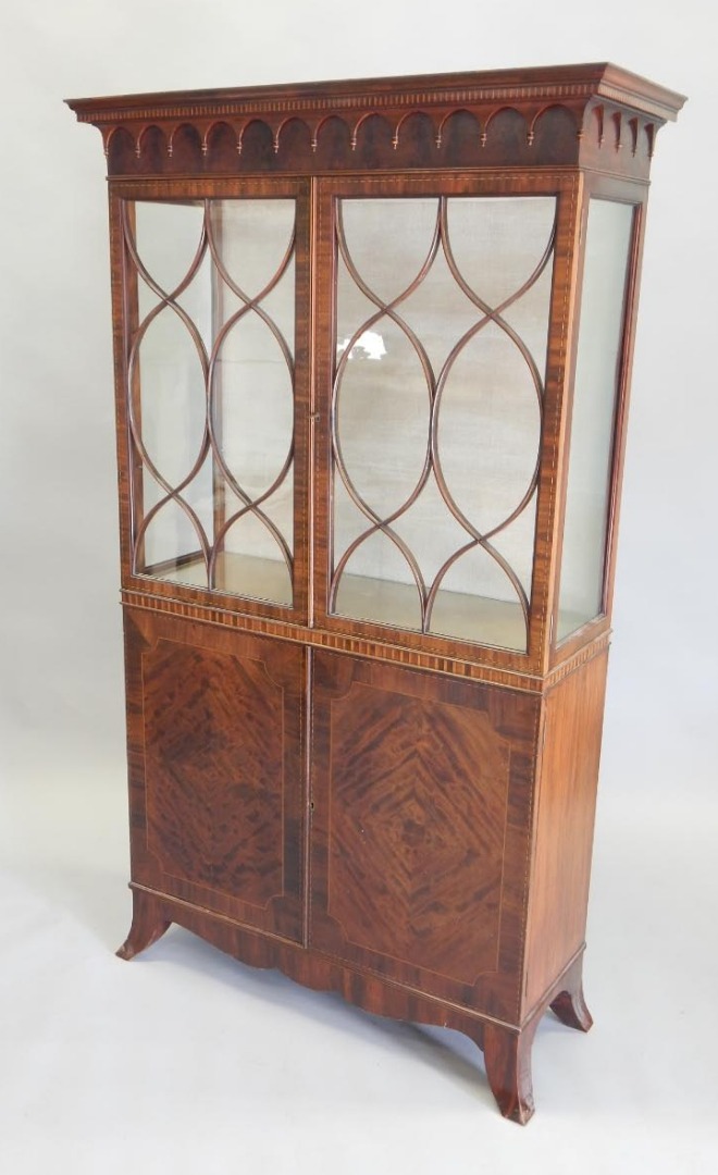 Appraisal: An early thC mahogany and chequer banded display cabinet with