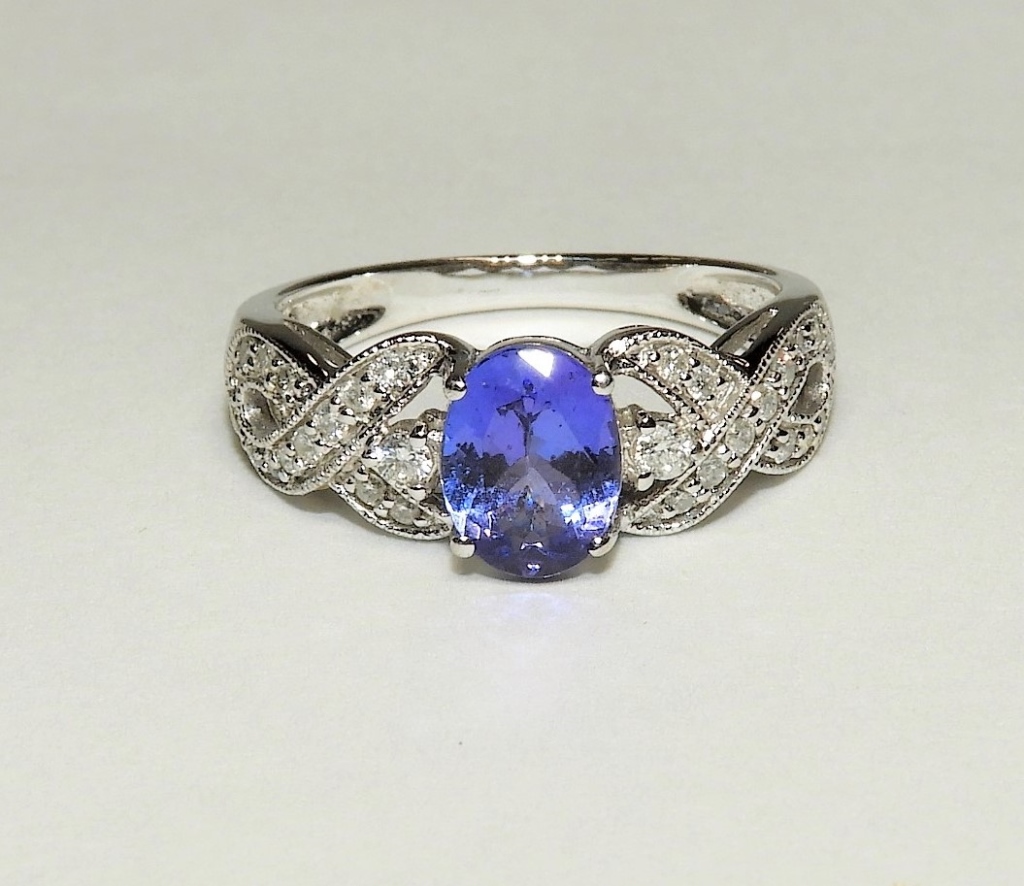 Appraisal: ESTATE K WHITE GOLD MOISONITE LADY'S RING China ContemporaryBlue glass