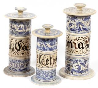 Appraisal: ITALIAN POTTERY APOTHECARY JARS THREE ITALIAN POTTERY APOTHECARY JARS THREE