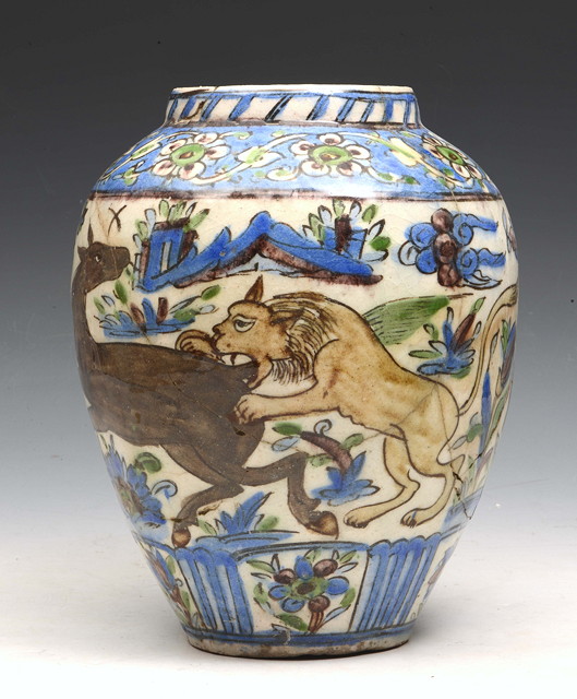 Appraisal: A PERSIAN OVOID VASE decorated with a horse being attacked