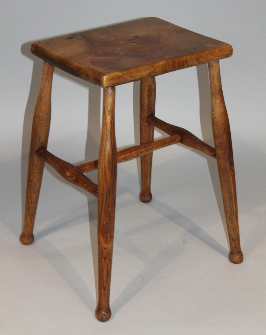 Appraisal: A late thC cherry wood and ash stool the rectangular