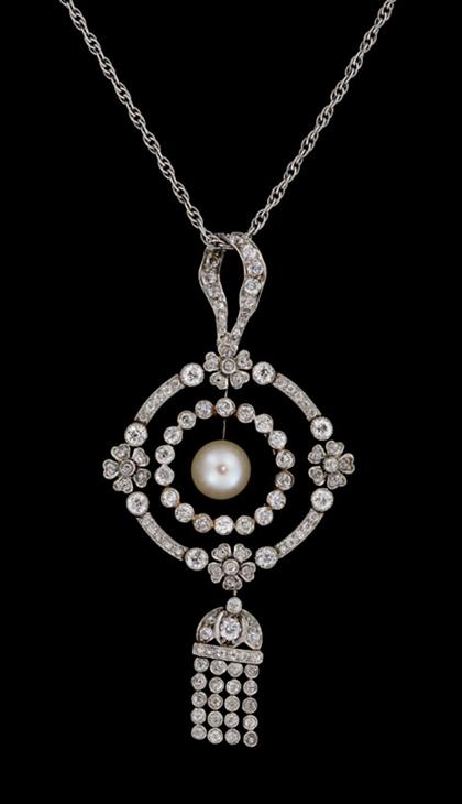 Appraisal: Platinum and diamond circle pendant with pearl belle epoque Delicate