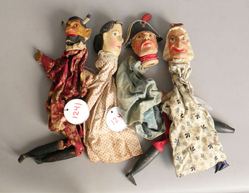 Appraisal: Four carved wood hand puppets early th c h