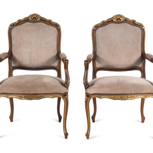 Appraisal: A Pair of Continental Parcel Gilt Armchairs with Suede Upholstery