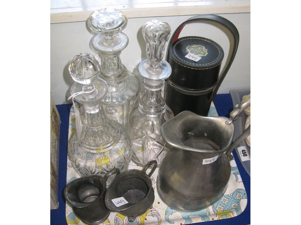 Appraisal: Lot comprising three pewter jugs three cut glass decanters and