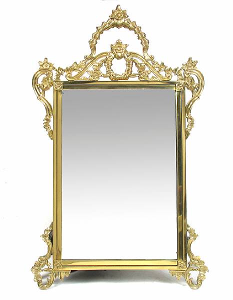 Appraisal: A Louis XVI gilt brass style wall mirror height in