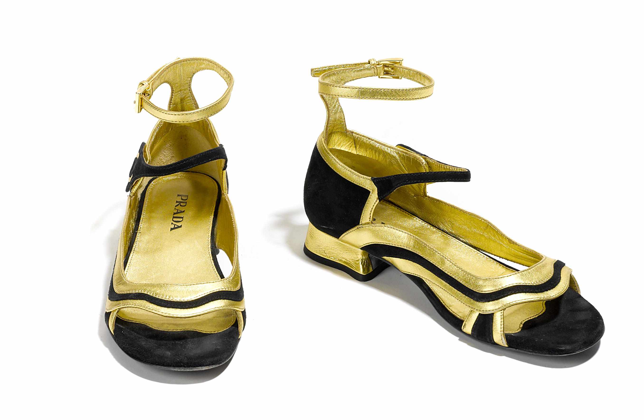 Appraisal: A pair of Prada black suede and gold metallic flats