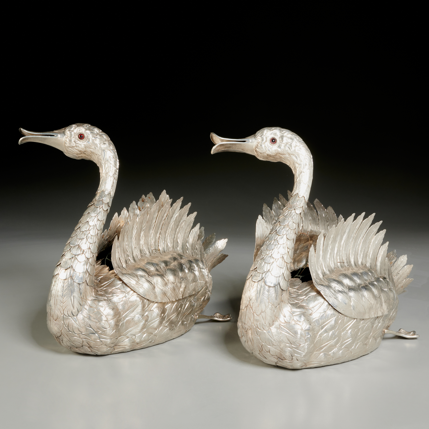 Appraisal: PAIR MANUEL ALCINO SILVER SWAN CENTERPIECES th c Portuguese beautifully