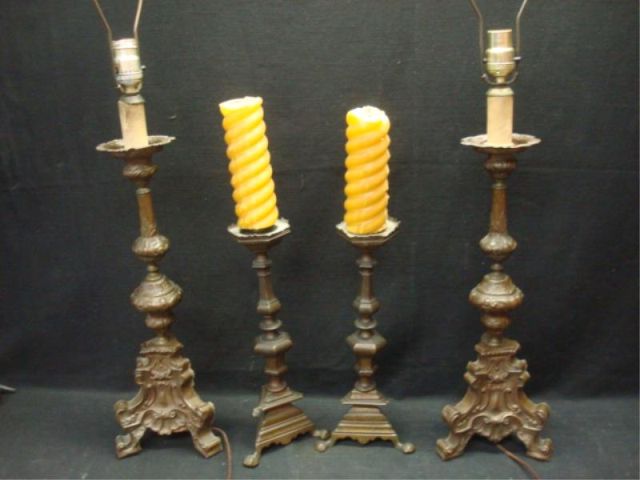 Appraisal: Pairs of antique candlesticks pair is tin or copper pair