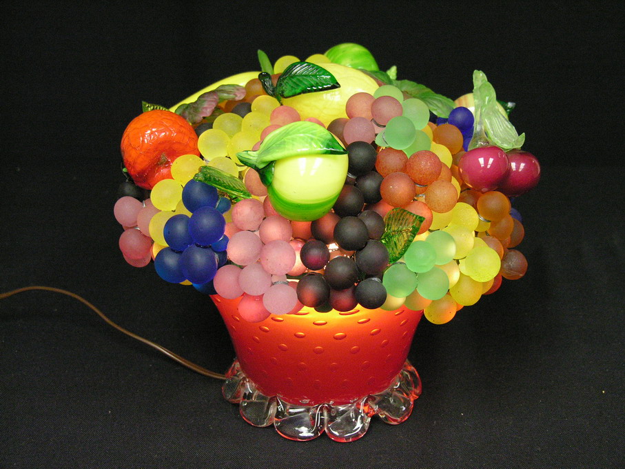 Appraisal: DECO GLASS FRUIT LAMP Controlled bubble base with glass fruit