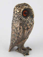 Appraisal: A silver owl pepperette with inset eyes by Richard Comyns