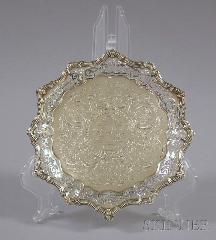 Appraisal: English Sterling Silver Presentation Tray with claw-and-ball feet presented in