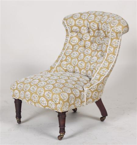 Appraisal: A late th century nursing chair the scroll top button-back