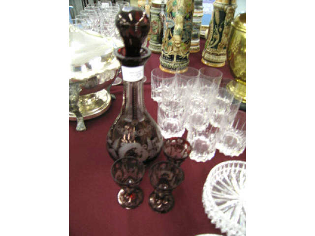 Appraisal: Bohemian Ruby Cut-to-Clear Decanter with cordials