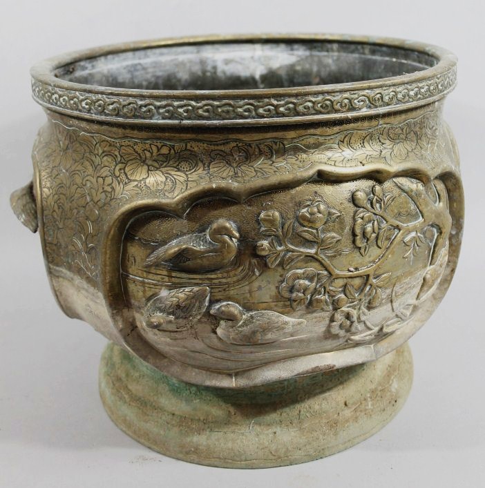 Appraisal: A thC Japanese metal jardiniere of circular outline profusely decorated