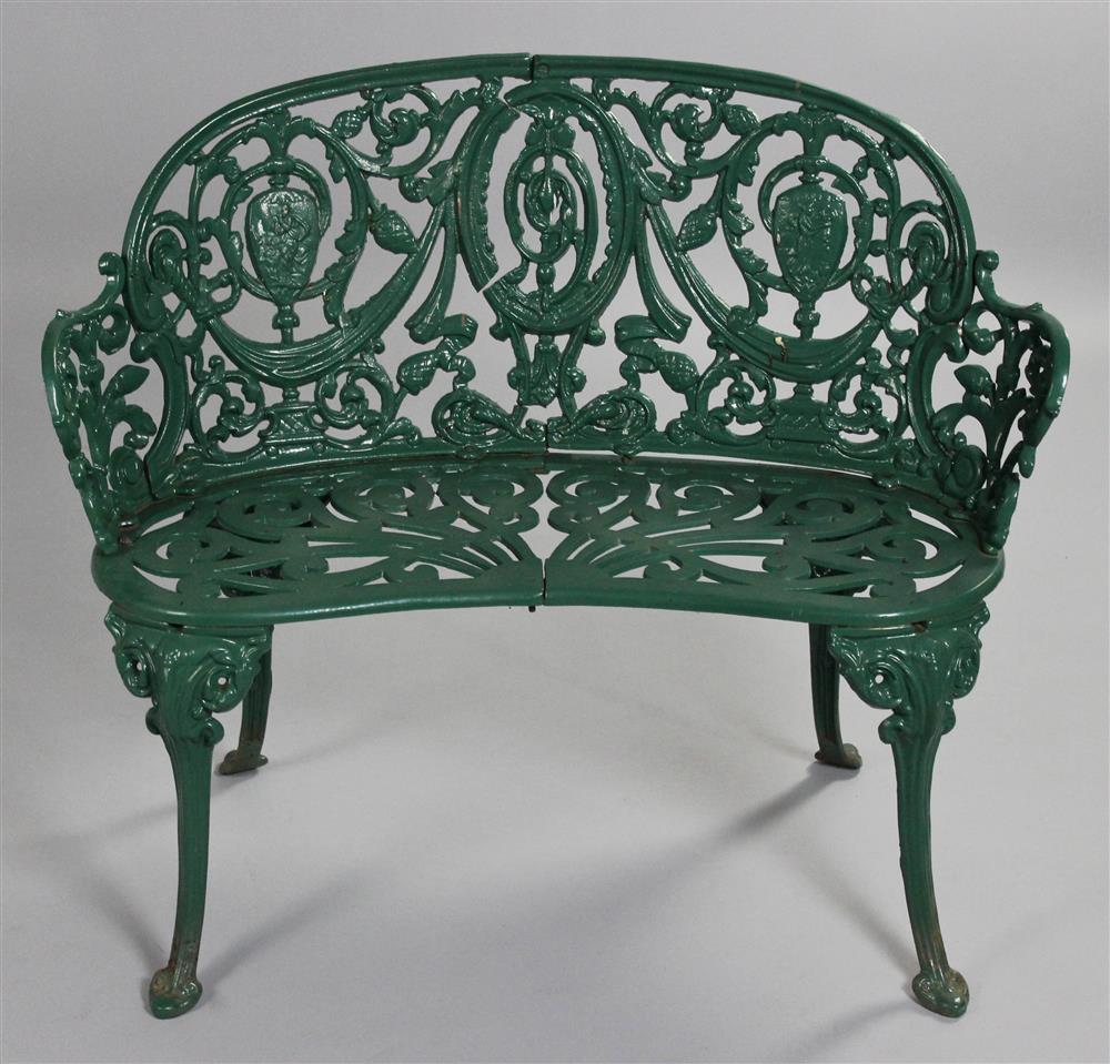 Appraisal: GREEN PAINTED CAST IRON GARDEN SETTEE having a shaped back