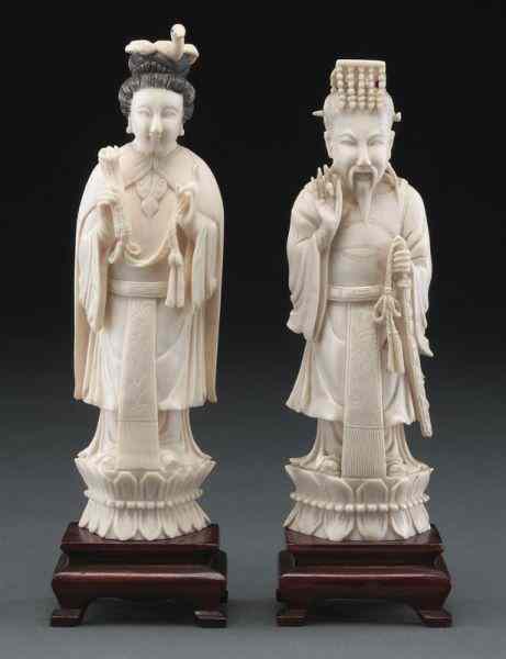 Appraisal: Pr Chinese carved ivory Emperor and Empress International buyers should