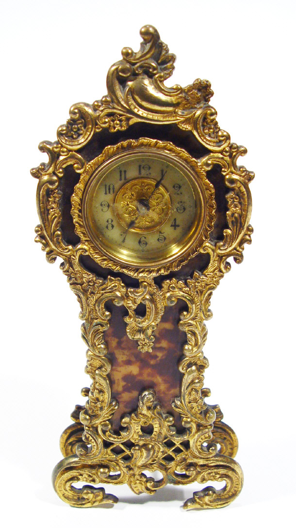 Appraisal: Simulated tortoiseshell mantel clock with applied ormolu mounts cm high